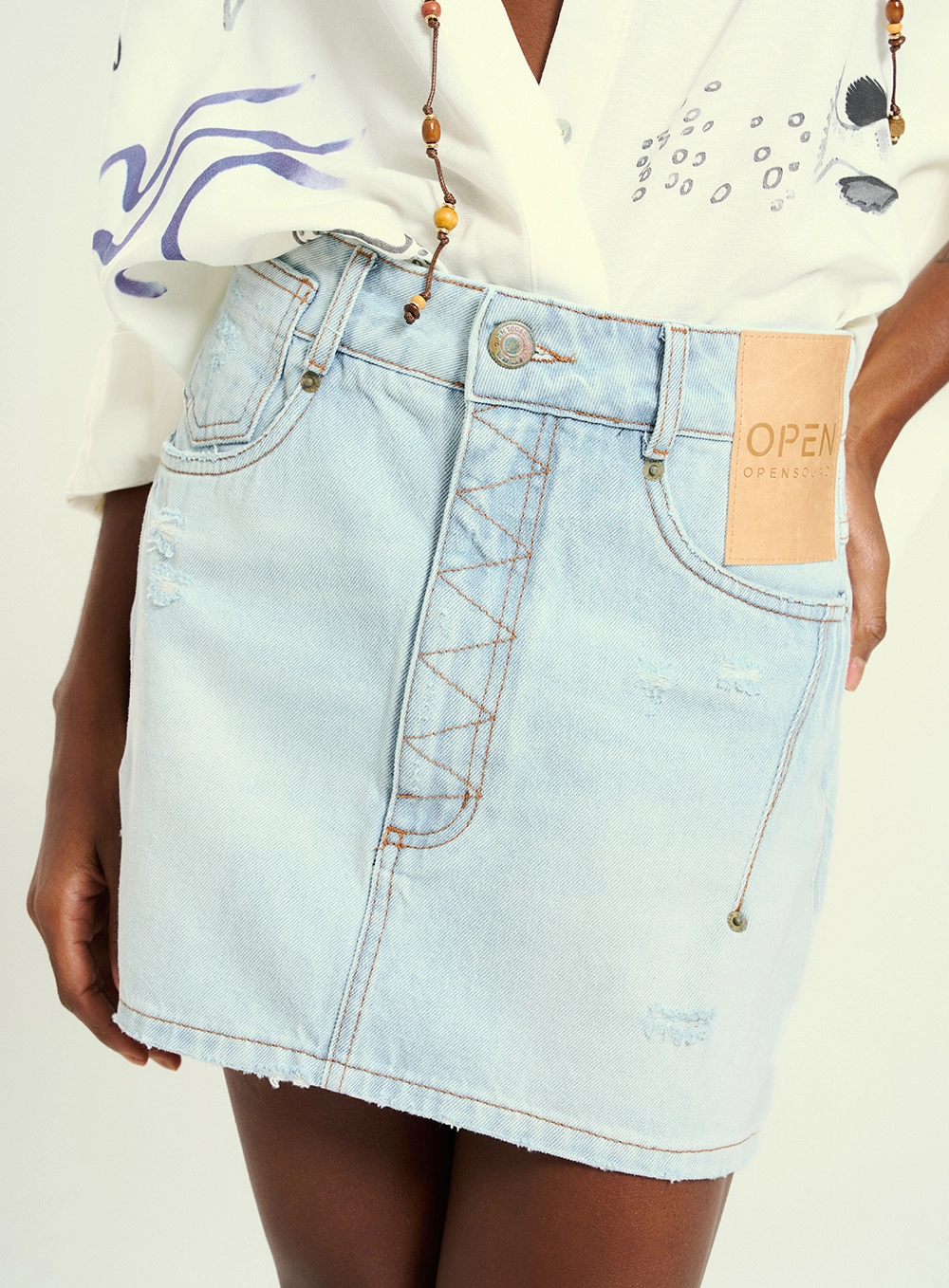 Saia Curta Jeans Com Bolsos - Imagem 2