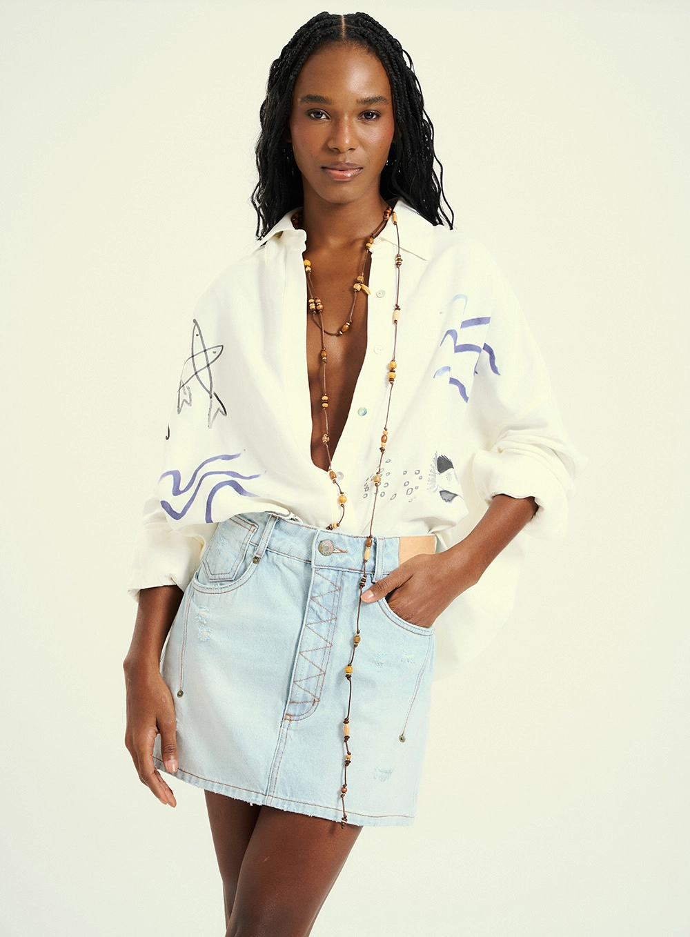 Saia Curta Jeans Com Bolsos